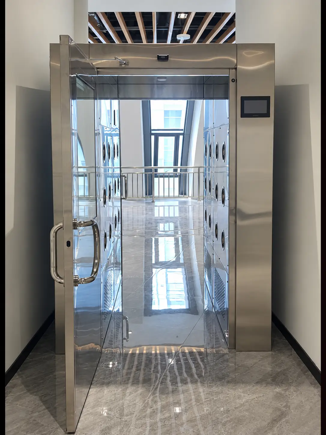 Front view of archive air-shower pass-through with open door