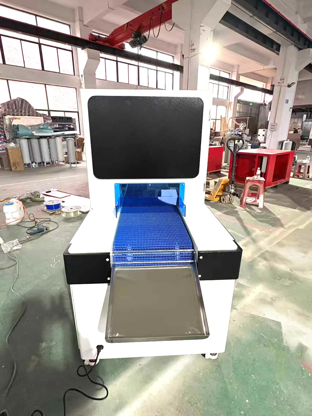Adsorption conveyor of the automated deacidification system